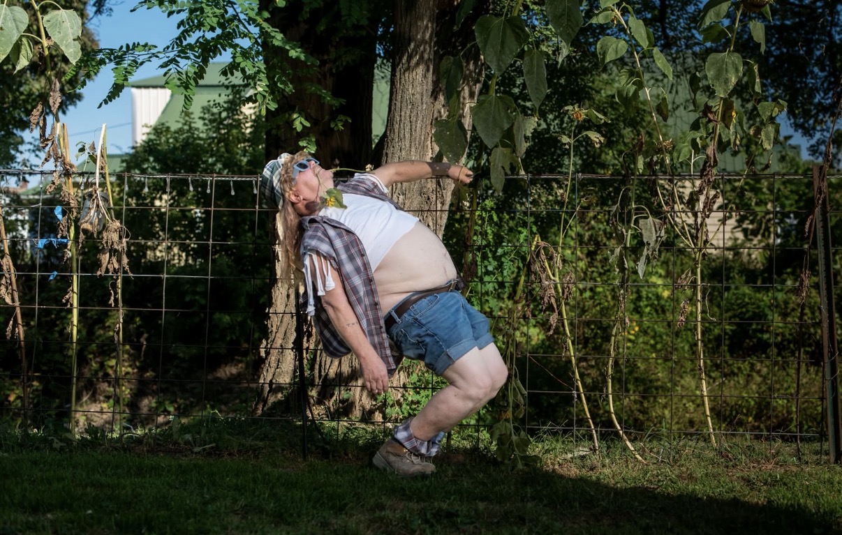 A friend making a funny pose outdoors