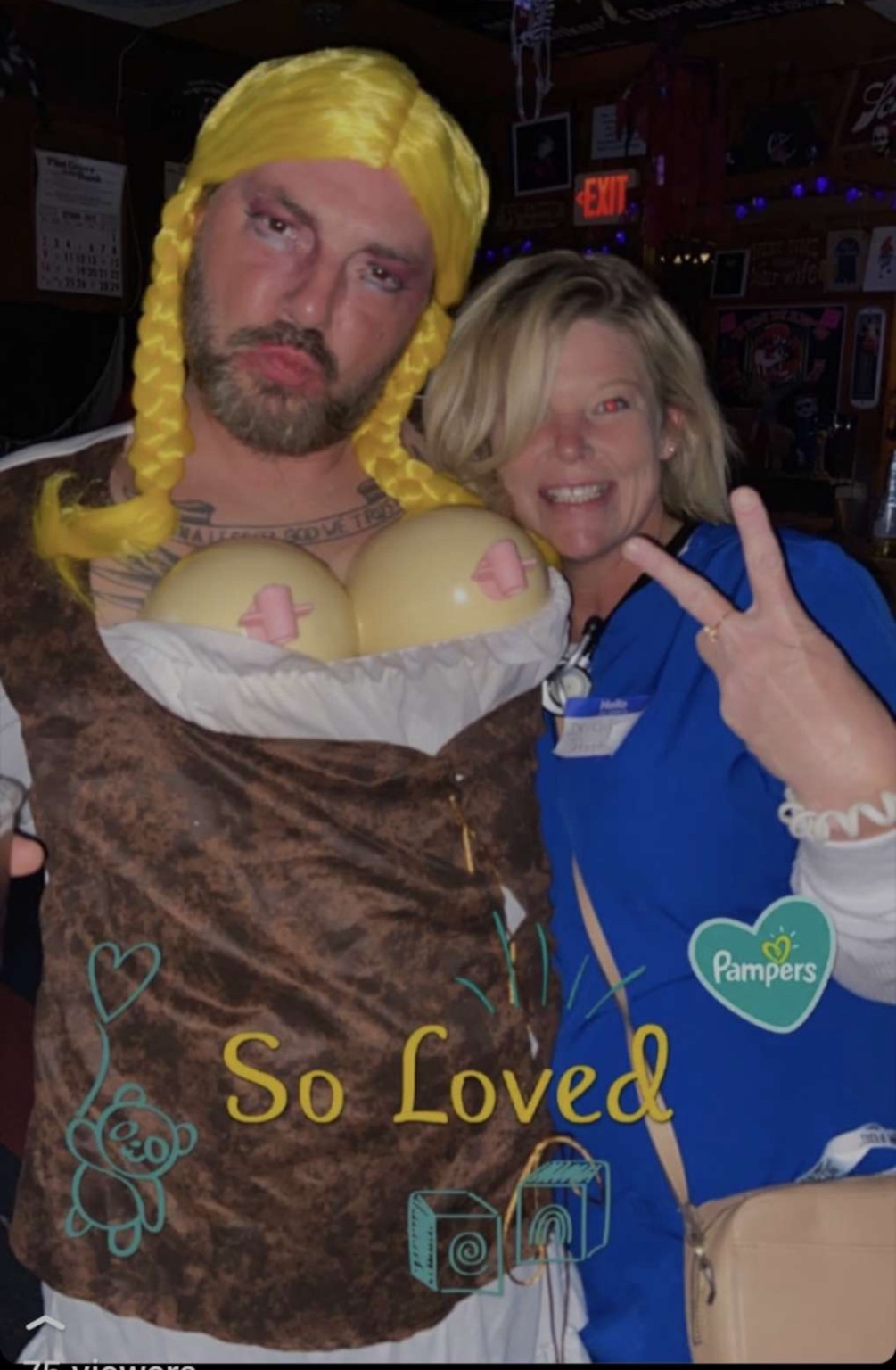 Two friends in a funny costume at the bar