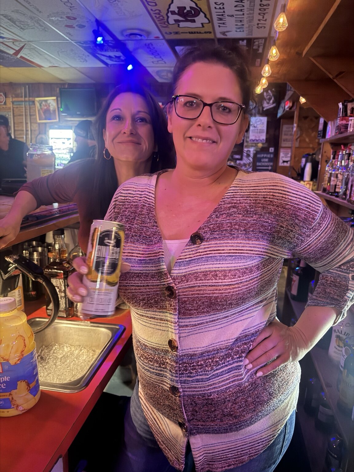 A friend posing at the bar